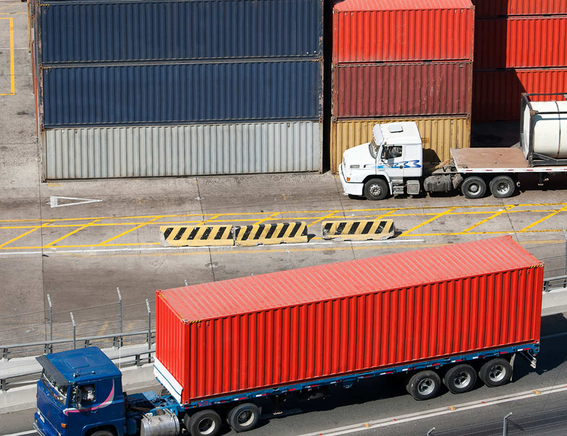HL Solutions logistics operations: containers and truck at port